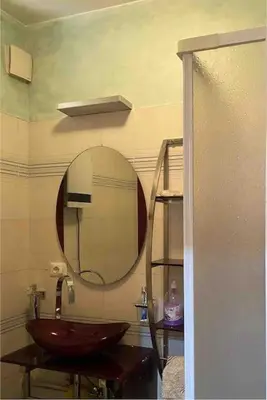a bathroom with a sink and a mirror at Domus romae esquilini in Rome