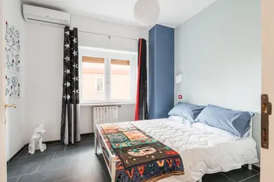 a bedroom with a bed in a room at Dalia's Place in Rome