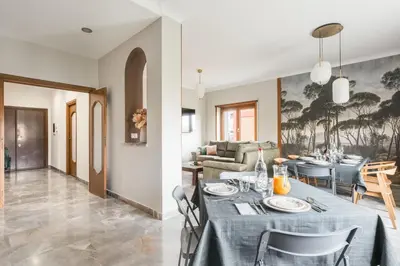 a living room with a table and a couch at Dalia's Place in Rome