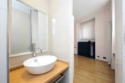 a bathroom with a white sink and a mirror at Vaticano in Rome