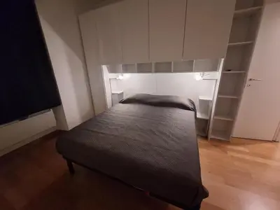 a small bedroom with a bed and a tv at Casa Vidaschi in Rome