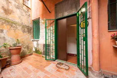 an open door of a building with sidx sidx at Maison della Luce in Rome