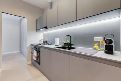 a kitchen with a sink and a counter top at CasaDoria51 in Rome