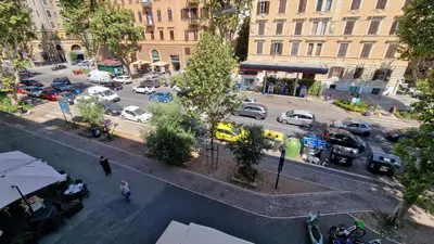 an aerial view of a busy city street with cars at CasaDoria51 in Rome