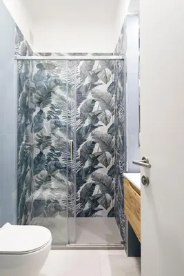 a bathroom with a shower and a toilet at @uRhOME - Luxury Accommodation in Rome