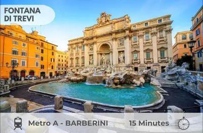 a view of a fountain in front of a building at Large Garden in Rome