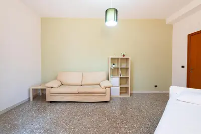 a living room with a couch and a table at Casa Di Cristina in Rome