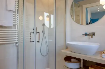 a bathroom with a shower and a sink at 633 APPIA DESIGN ROOM in Rome