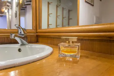 a bathroom sink with a soap dispenser on a counter at Antica Dimora al Vaticano in Rome