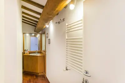 a bathroom with a sink and a mirror at Antica Dimora al Vaticano in Rome