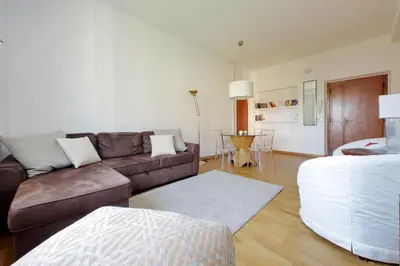 a living room with a couch and a table at YCH-Confortevole appartamento vicino Ponte Milvio in Rome