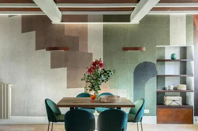 a dining room with a wooden table and chairs at iFlat The Great Beauty in Rome