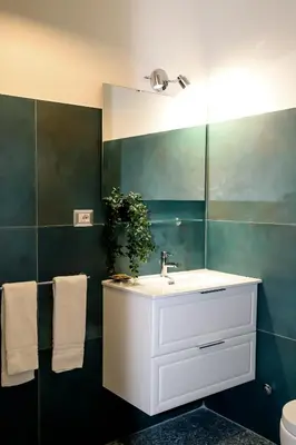 a bathroom with a white sink and a mirror at MyWay RDR in Rome
