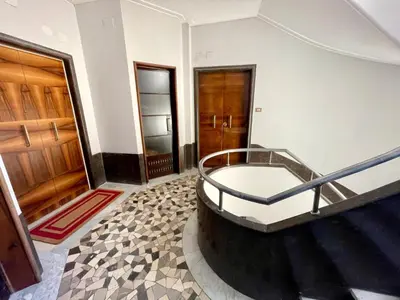 a room with a tub and two doors at Casa Vasari in Rome