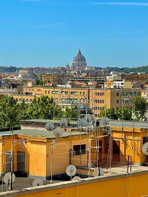 a view of a city from the roof of a building at Casa Vasari in Rome