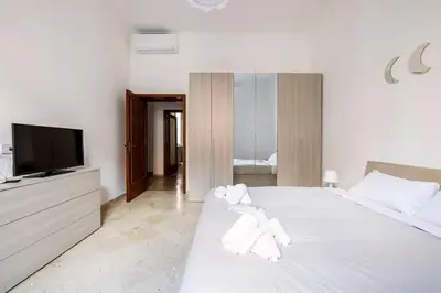 a living room with a couch and a table at Casa amoR in Trastevere in Rome