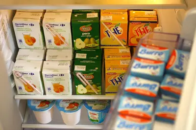a refrigerator filled with lots of milk and eggs at Passenger Vatican Relais in Rome