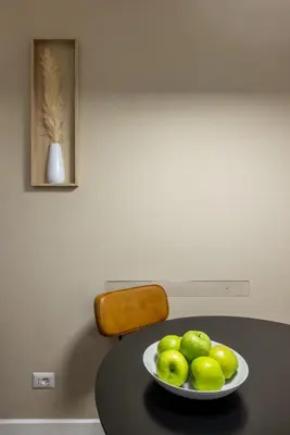 a bowl of green apples sitting on a table at Vatican 2BR apartment in Roma in Rome