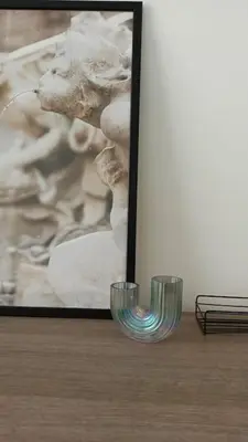 two glasses sitting on a table next to a painting at Rome - Termini House in Rome