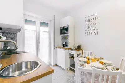 a kitchen with a sink and a counter at Il rifugio dei nonni by Rentbeat in Rome