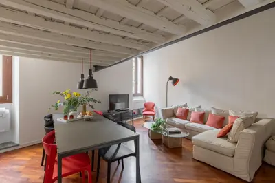 a living room with a couch and a table at iFlat The Tiber Gem in Rome