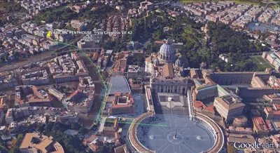 an aerial view of a city with a clock tower at Vatican Penthouse Near S.Peter's Square in Rome