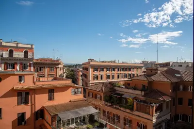 an aerial view of a city with buildings at Carolina Trastevere House in Rome
