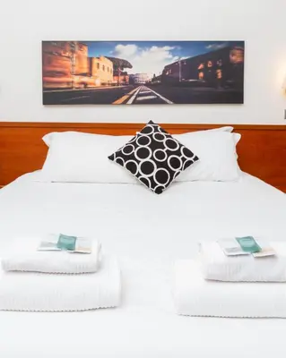 a bedroom with a large white bed and a window at Rental in Rome 2012 Guest House - ZEN16 in Rome