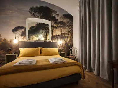 a bedroom with a bed with a painting on the wall at Afnakafna Home in Rome