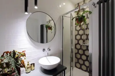 a bathroom with a sink and a mirror at YCH TRILOCALE FINEMENTE ARREDATO VICINO ALLA METRO in Rome