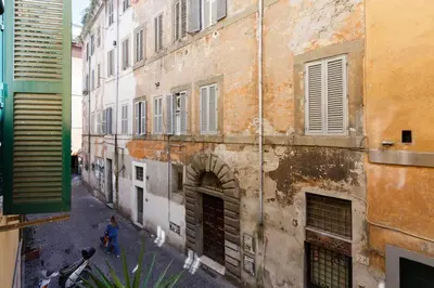 an view of an alley with an old building at Navona 360 in Rome