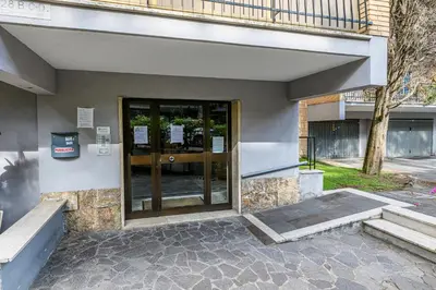 a entrance to a building with a glass door at AmoRoma Holiday in Rome