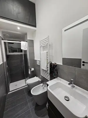 a bathroom with a sink and a toilet at Apartment Roma Centro San Pietro e Musei Vaticani in Rome