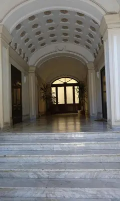 a large room with stairs and a ceiling at Piccolo Principe Suite in Rome