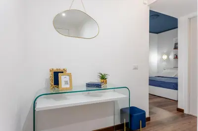 a glass shelf in a bedroom with a bed at Suite Vaticano in Rome