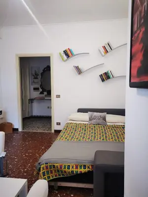 a bedroom with a bed in a room at Appartamento di Sara in Rome