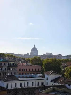 a view of the capitol building from the roofs of buildings at ST. PETER'S ROOMS SUITE in Rome