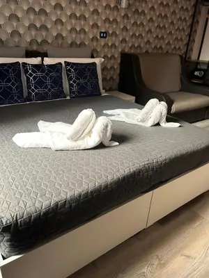 two towels on a bed in a bedroom at Vanella Rome Domus in Rome