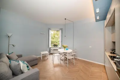 a living room with a couch and a table at Domus Pietrae in Rome