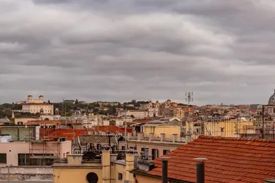 a view of a city with buildings and roofs at Skyline Penthouse with Private Rooftop in Rome