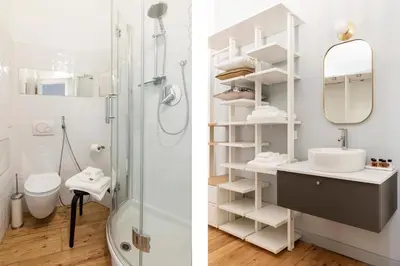 a bathroom with a shower and a sink and a mirror at Elegante Dimora a Trastevere in Rome