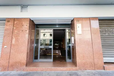 an entrance to a building with glass doors at Trastevere's Friends in Rome