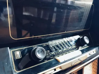 an old radio with two speakers and a controller at A Place in Prati in Rome