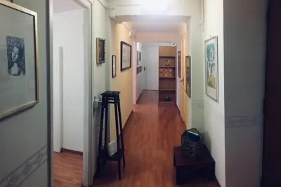 a hallway leading to a hallway with a room with a hallway at A Place in Prati in Rome