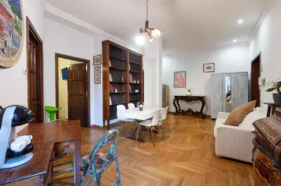 a living room with a couch and a table at Passeggiata al Vaticano in Rome