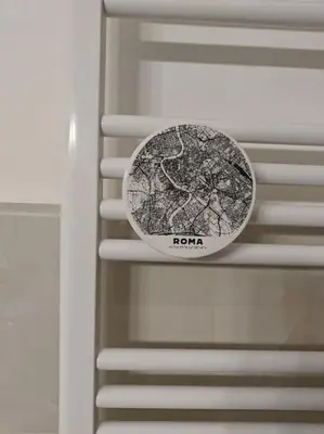 a plate with a map of rome on a wall at Appartamento Aurelio - Vaticano in Rome