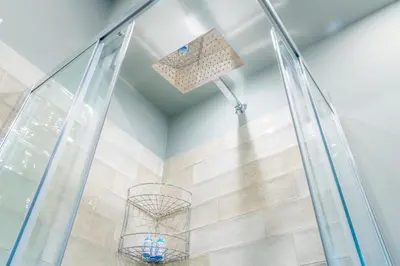 a shower with a glass door and a ceiling at Contessa Elegance Inn in Rome