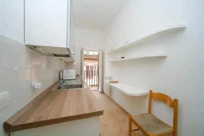 a kitchen with a sink and a counter top at Elisa's Trevi Fountain BuddyRent in Rome