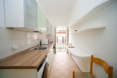 a kitchen with a sink and a counter top at Elisa's Trevi Fountain BuddyRent in Rome