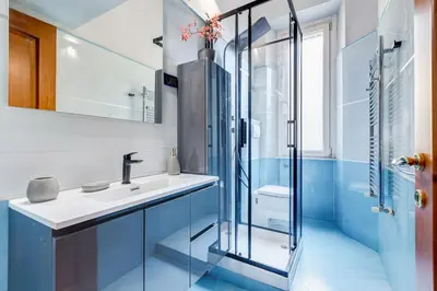 a bathroom with a sink and a shower at Historia et Elegantia - vicino il Colosseo, Circo Massimo e Trastevere in Rome